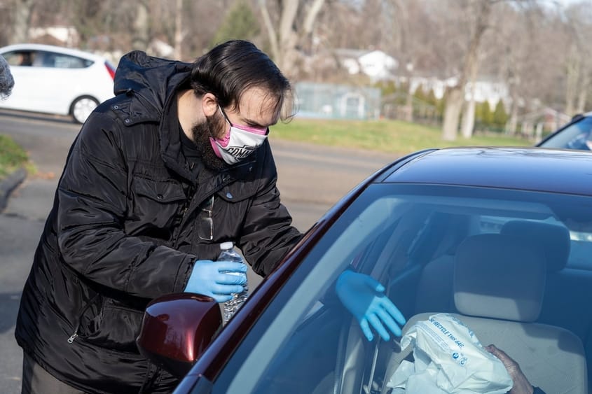 WWE HQ employees hand out free meals at the Stamford Senior